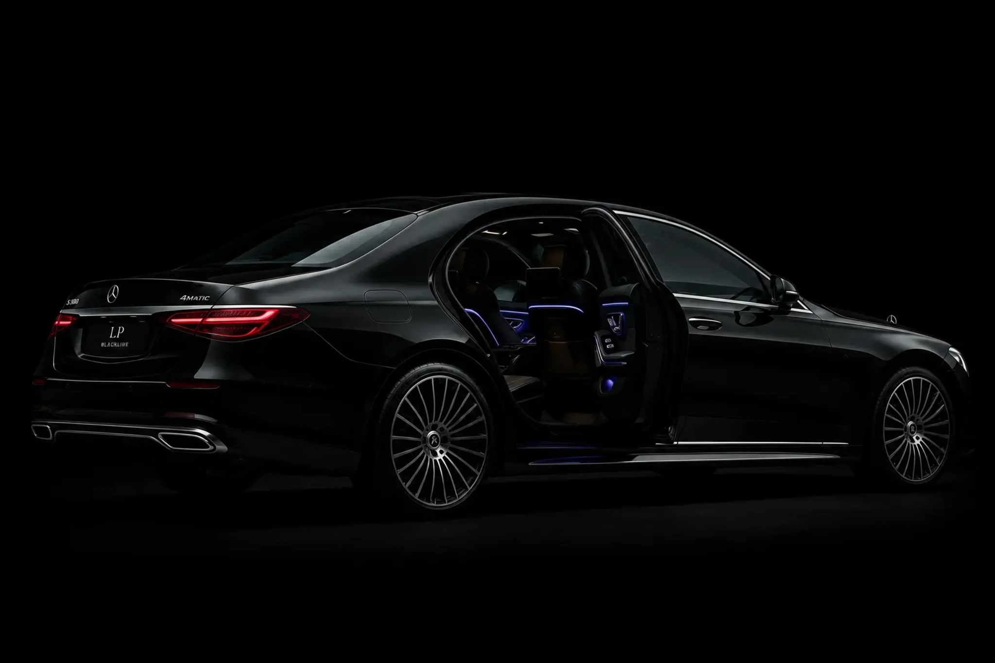 LPBLACKLINE Mercedes-Benz S580 with the rear door open, ambient cabin lighting